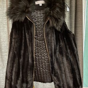 Black faux fur vest